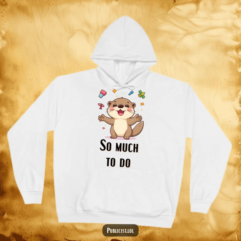 Funny hoodie with a playful otter juggling colorful flyers with a wide grin, embodying humorous multitasking and cheerfulness.
